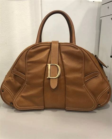 borsa saddle christian dior|More.